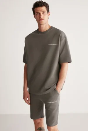 ست ورزشی مردانه تیشرت و شلوارک والیبالی پوما طرح دار خاکستری